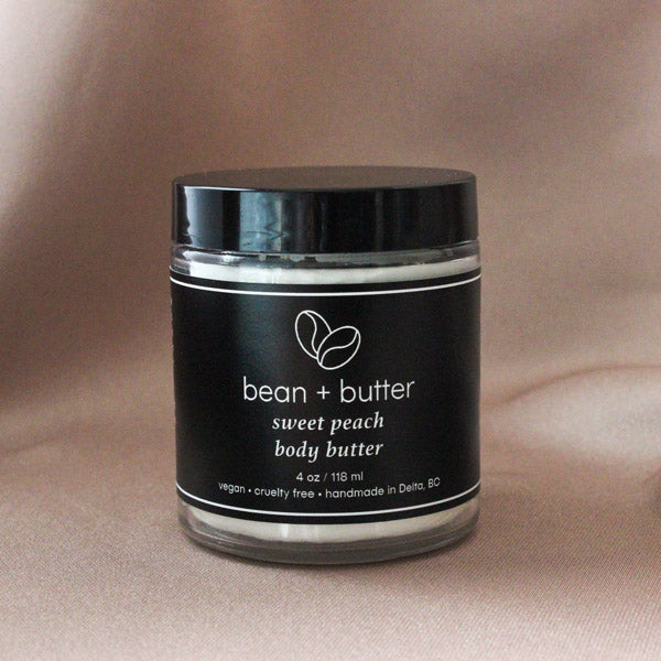 Bean + butter sweet peach body butter in a 4 oz jar